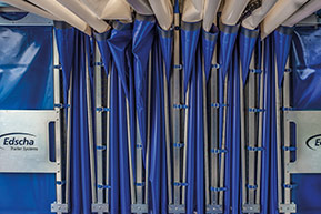 Neatly folded tarpaulin thanks to extension springs and patented fastening system